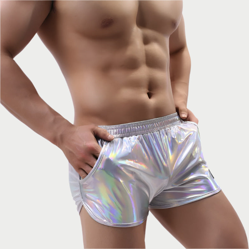 This image features metallic shorts, which are eye-catching due to their shiny, reflective surface. These shorts are silver with a holographic pattern that gives them a unique, glimmering appearance.