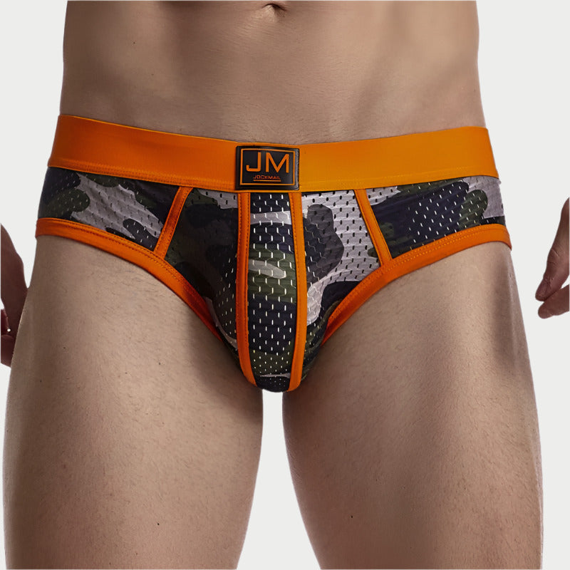 This image features a pair of men's camo mesh briefs, designed for both comfort and style. The waistband is bright orange, providing a striking contrast to the camouflage print on the front.
