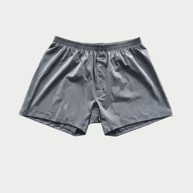 Dark gray boxer shorts on a light gray background