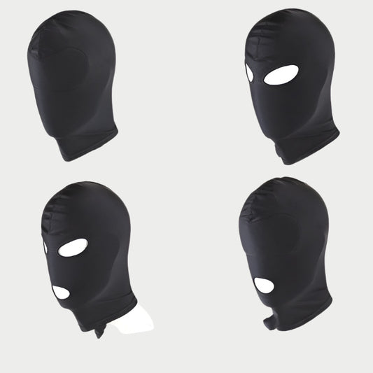 Four black balaclavas with eye holes on a white background