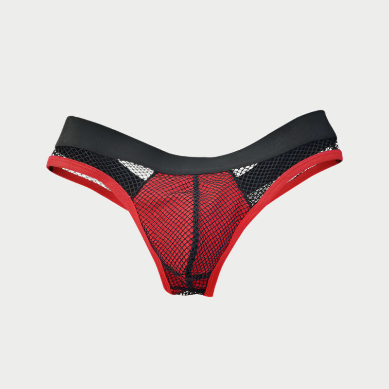 Red and black fishnet thong on a light gray background