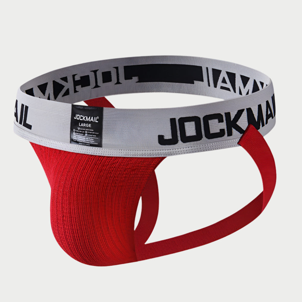 A red and gray Jockmail jockstrap with a narrow waistband and a drawstring.