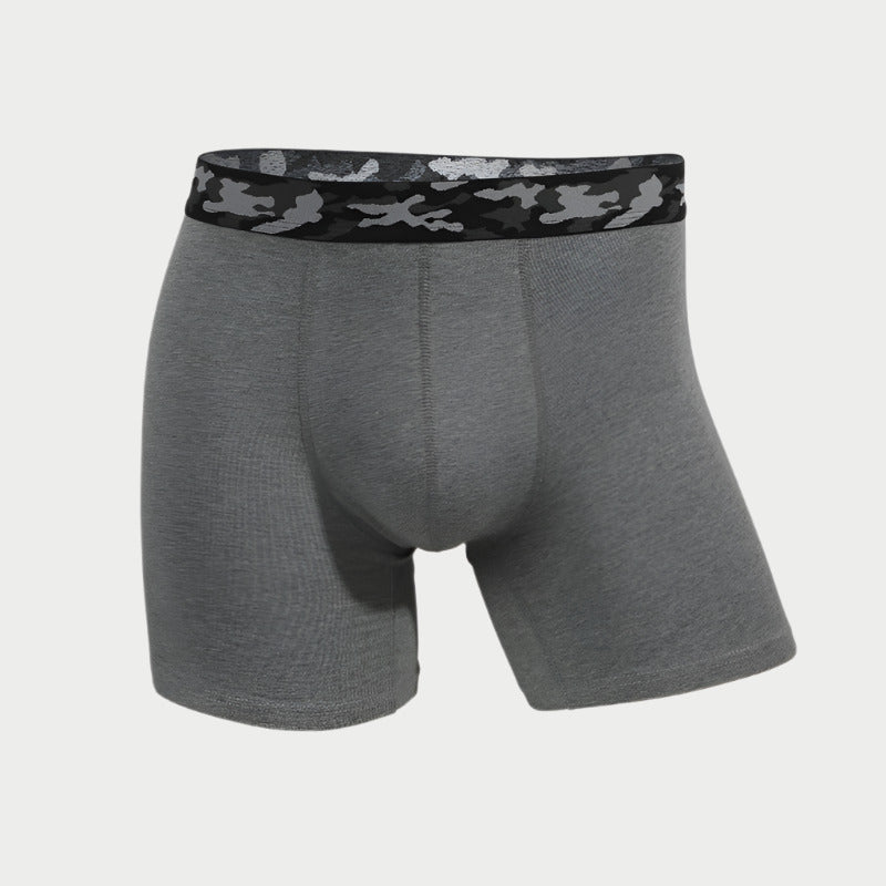 A pair of gray boxer briefs with a camo patterned waistband.