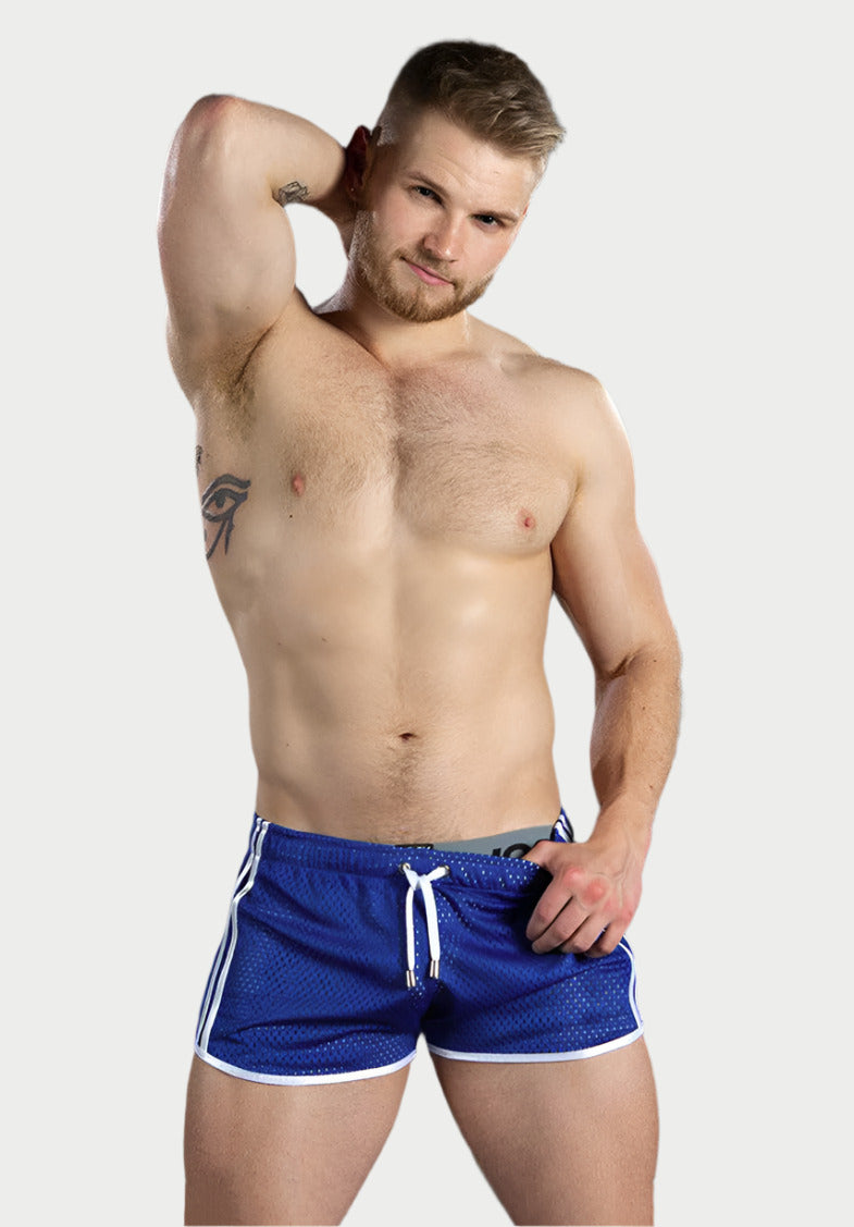 This image features a pair of Quick-Dry Mesh Shorts, designed for optimal comfort and performance during active lifestyles. The shorts are crafted from a moisture-wicking fabric that ensures quick drying, promoting a cool and dry experience.