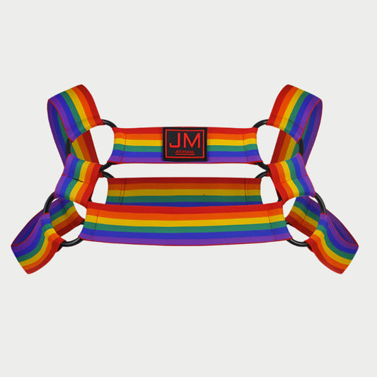 A rainbow-colored elastic harness with a black logo that reads 'JM' in the center