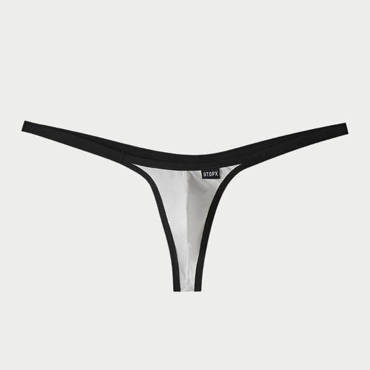 A black and white nylon thong underwear for men, with a visible brand label.