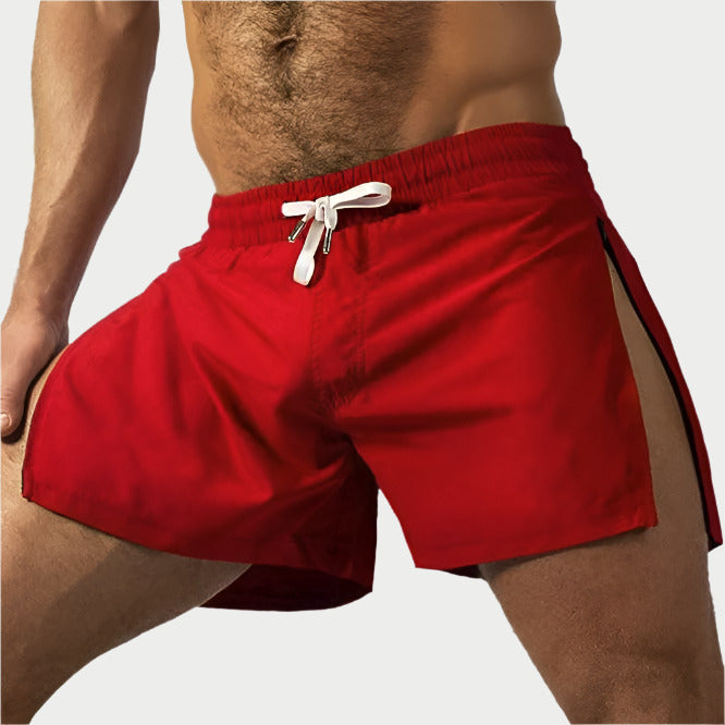 Red shorts with a white drawstring on a white background