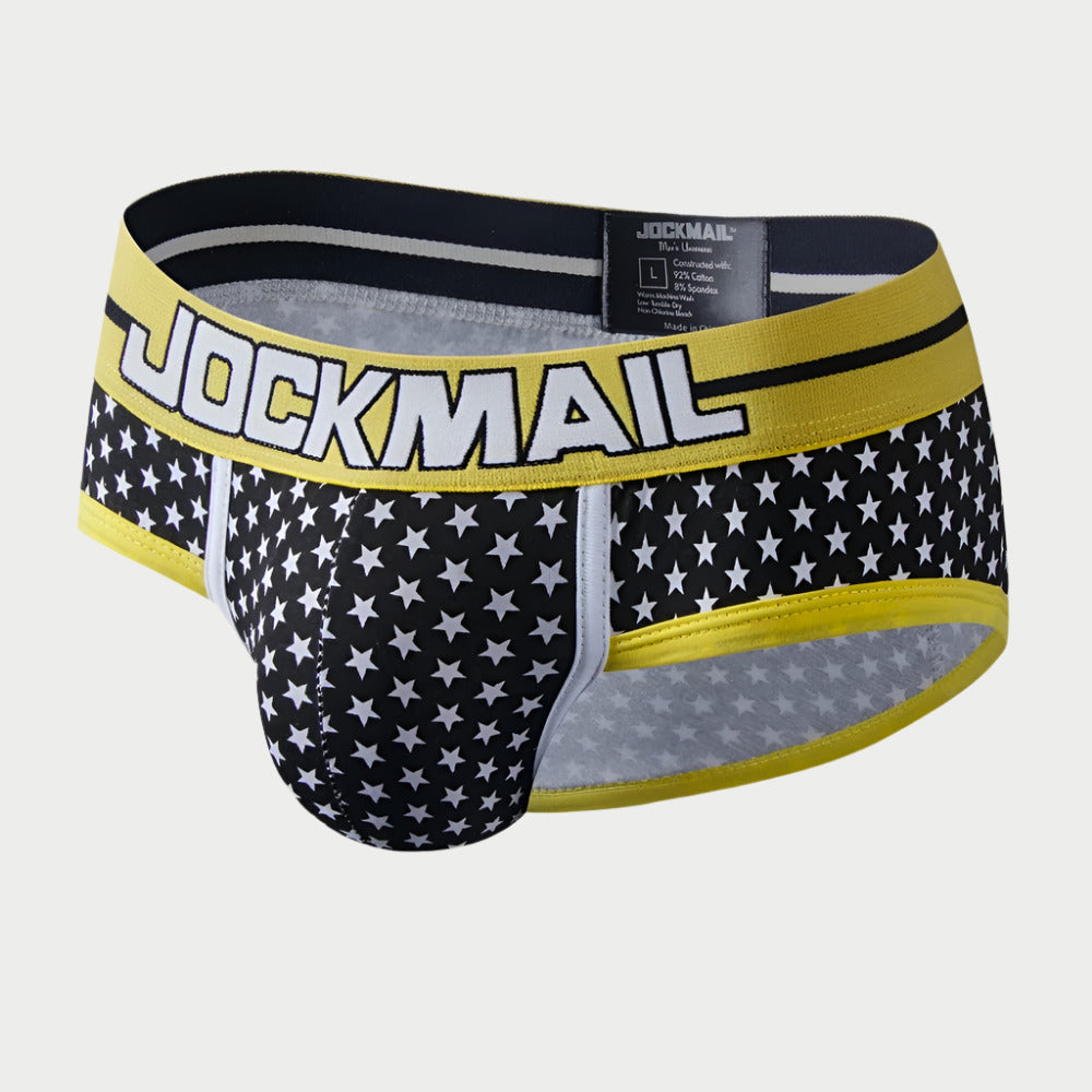 Men's underwear with star pattern and yellow waistband on a white background