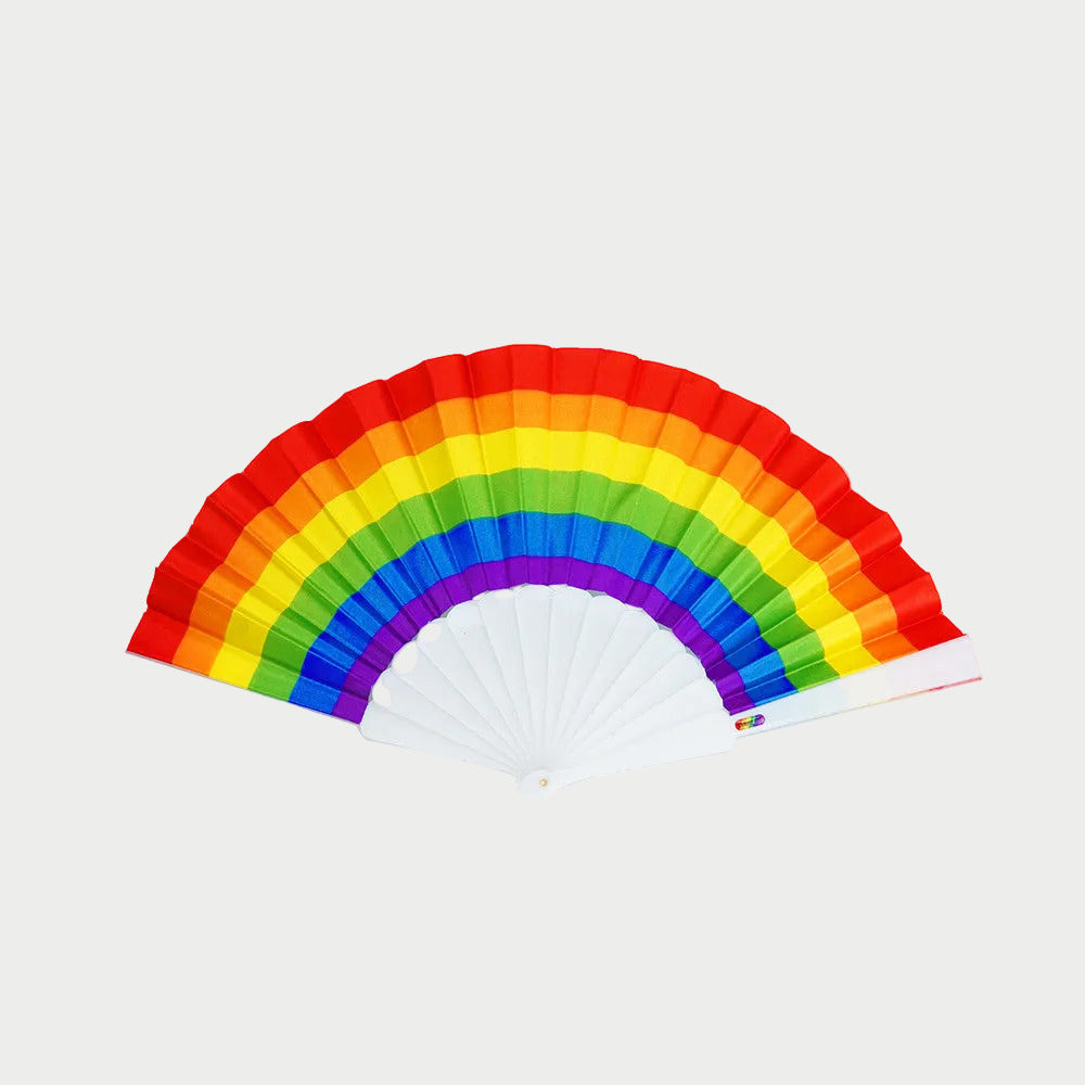 Rainbow-colored hand fan on a white background