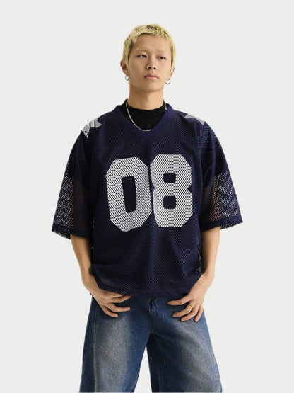 Person wearing a navy blue sports jersey with '08' on a light gray background
