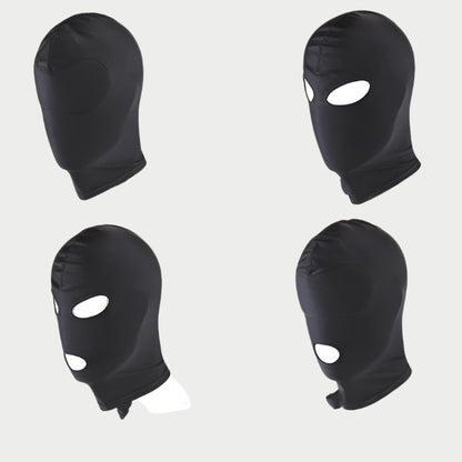 Four black balaclavas with eye holes on a white background