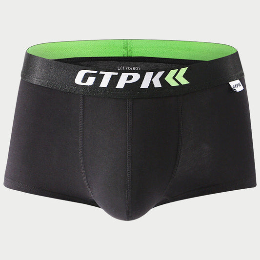 Black boxer briefs with green waistband and 'GTPK' branding on a light gray background