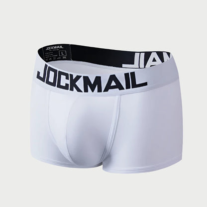 White boxer briefs with black waistband featuring 'Jockmail' branding on a white background.